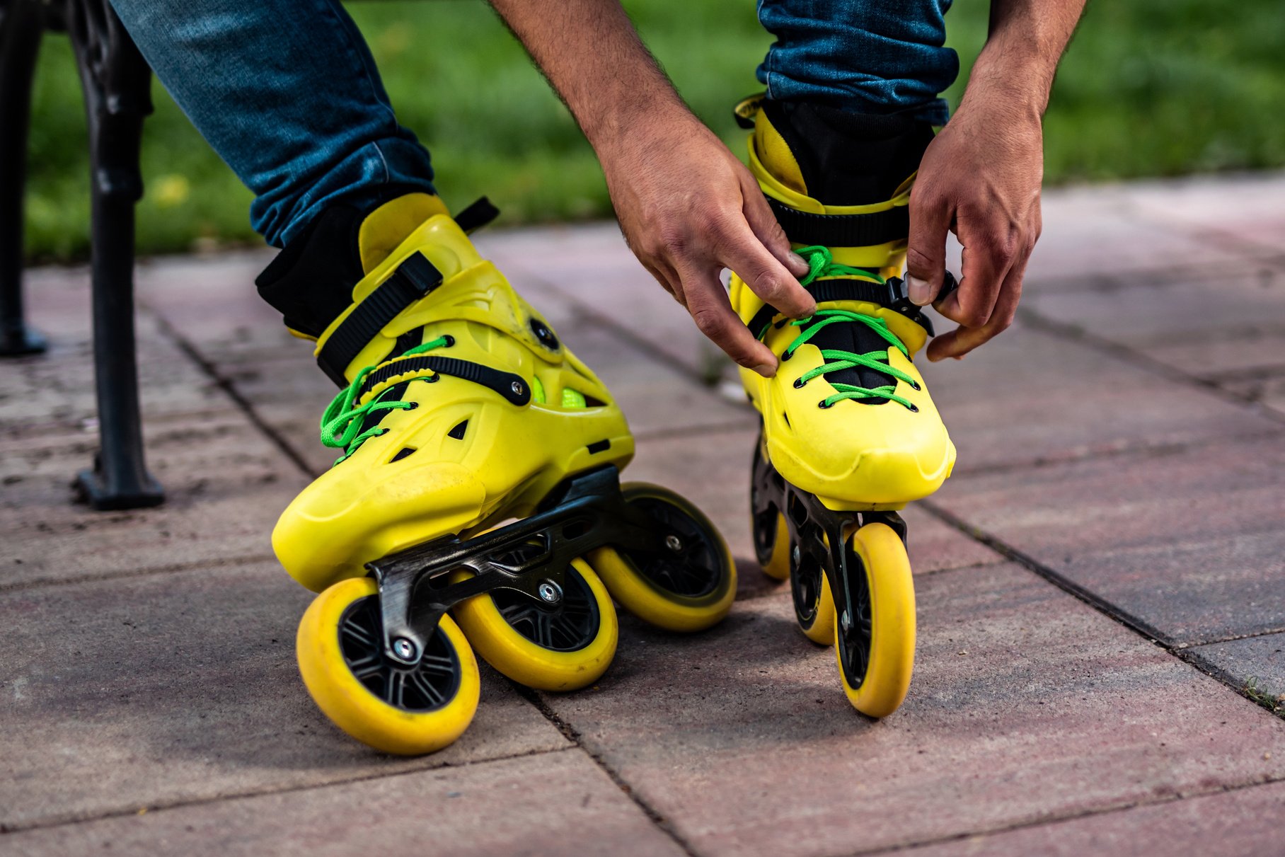 Man adjusting inline skates